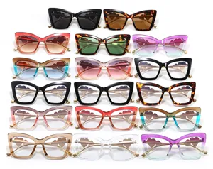 Detailed view of multiple colorful cat-eye glasses featuring trendy heart-shaped lens accents