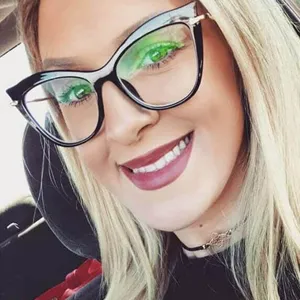 Close-up detail of stylish cat-eye anti-blue light glasses worn by a female model.