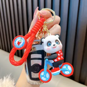Cute cartoon panda riding a bicycle PVC soft rubber keychain charm for car keys and bags