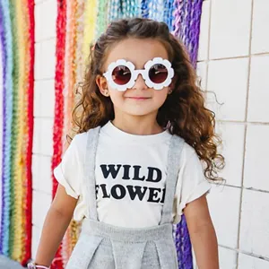 Cute white flower-shaped kids sunglasses with UV protection for stylish boys and girls