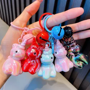 Assorted colorful electroplated acrylic unicorn keychains with matching bells for backpacks