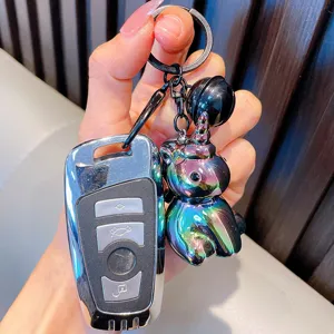Colorful iridescent electroplated 3D unicorn keychain with black bell and metal ring