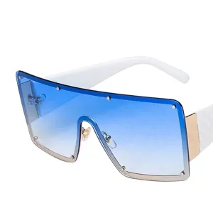 Oversized one-piece sunglasses with blue gradient lenses and white temples