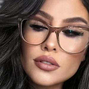 Close-up of stylish cat-eye anti-blue light glasses on a female model wearing makeup.