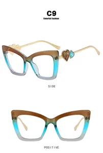 Detail showing gradient cat-eye frame and heart-shaped temple accents of blue light glasses