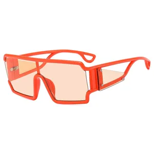Trendy futuristic oversized orange sunglasses with geometric frame and side shields for men.