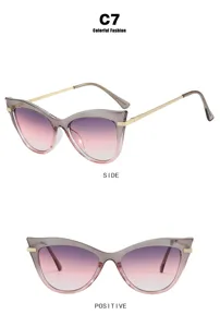 Cat-eye glasses frame featuring purple pink gradient lenses and gold temples side front view
