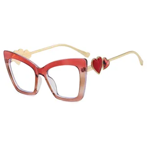 Fashionable cat-eye glasses with red gradient frames and gold heart temples.