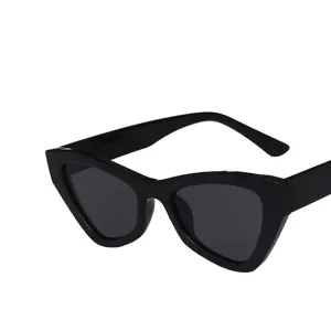 Stylish black cat-eye sunglasses for women with a vintage retro design and dark lenses