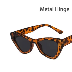 Stylish tortoiseshell cat eye sunglasses for women with dark lenses and vintage flair.