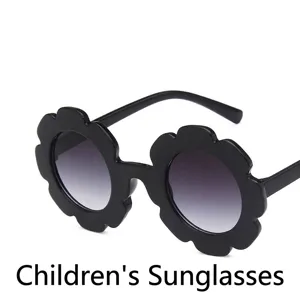 Cute flower-shaped black children's sunglasses with stylish gradient lenses for kids