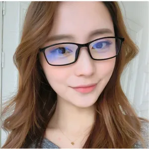 Young woman wearing stylish black square frame anti-blue light computer glasses