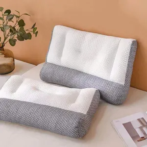 Close-up of 3D textured neck support pillow with gray and white pattern.