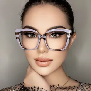 Close-up of model wearing oversized lavender square blue light blocking glasses.