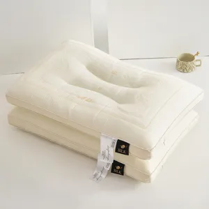 Detailed view of cream embroidered butterfly Tencel latex pillow with soft texture