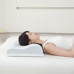 Vista lateral de una almohada ergonómica de espuma viscoelástica para cuello
