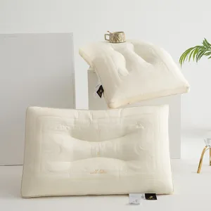 Detailed view of cream butterfly tencel latex pillow with intricate floral embroidery