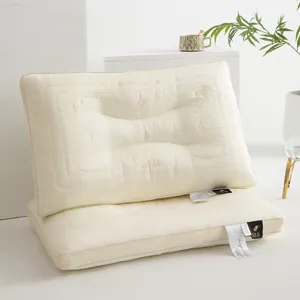 Premium Tencel latex pillows with elegant 3D embroidery in a minimalist setting