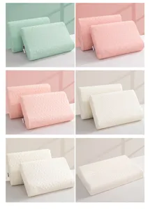 Detail view of natural latex pillows with bean and diamond textures in various colors