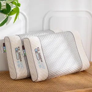 Two natural latex cooling pillows with textured surface and Ice Sense blue embroidery