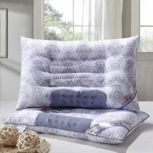 Detailed view of the ergonomic cassia seed pillow featuring a purple damask pattern