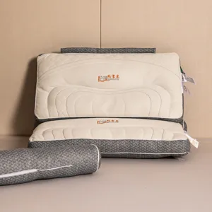 Close-up of detachable ergonomic neck pillow with herringbone pattern