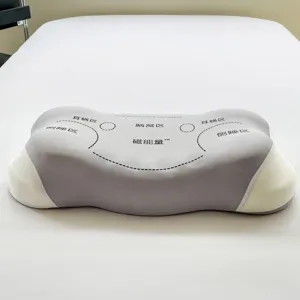 Ergonomisches Memory-Foam-Kissen mit Zonenunterstützung zur Nackenschmerzenlinderung.