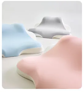 Almohadas ergonómicas multifunción en azul, gris y rosa para el soporte cervical.