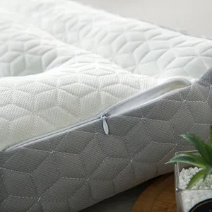 Detail view of breathable cervical latex pillow with geometric mesh and hidden zipper