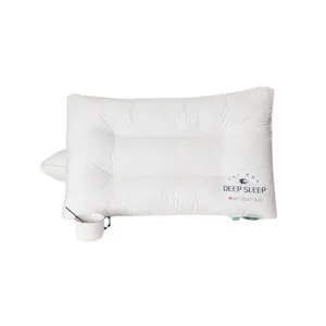 High-quality white long-staple cotton hotel pillow featuring Deep Sleep embroidery detail
