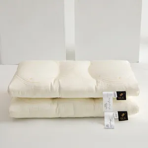 Stacked cream butterfly tencel latex pillows with detailed 3D embroidery details