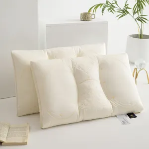 Detailed view of the 3D embroidered butterfly Tencel latex pillow with soft texture