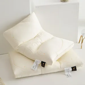 Close-up detail of cream Tencel pillow featuring elegant butterfly 3D embroidered patterns