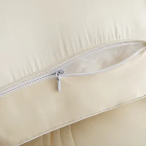 Close-up detail of Tencel pillow showing invisible zipper and soft white filling