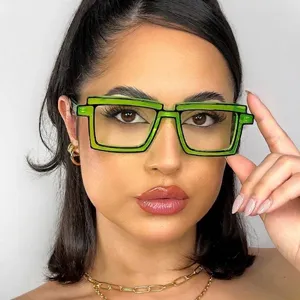 2D cartoon style oversized glasses frame with green frames and TR90 anti-blue light lenses.