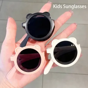 Set mit niedlichen, faltbaren Kindersonnenbrillen in Bärenform in Pink, Weiß und Schwarz