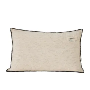 Minimalist cotton children's pillow with textured fabric and dark zigzag border