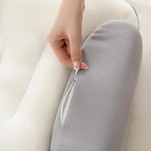 Almohada ergonómica de espuma viscoelástica con funda gris de punto gofre lavable