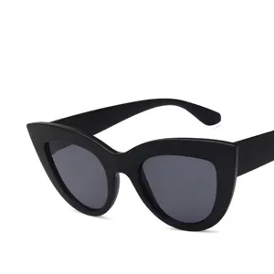 Vintage cat-eye sunglasses in matte black frame for a stylish retro aesthetic look