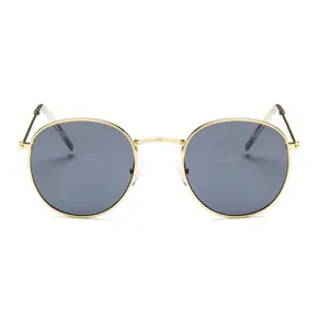 Retro round metal sunglasses with elegant gold frame and dark lenses for UV protection