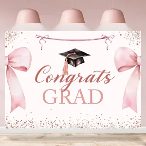 Pink graduation party backdrop with Congrats Grad text and rose gold glitter