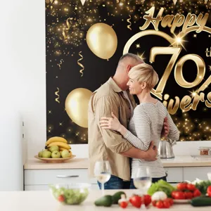 Black gold 70th anniversary celebration backdrop with balloons for wedding party decoration