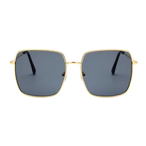 Classic retro square metal sunglasses with large frames and dark lenses in gold finish.