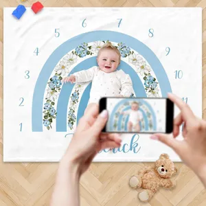 Soft blue floral rainbow baby milestone blanket for monthly growth photography record