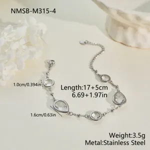 Detalle de pulsera de acero inoxidable con piedras preciosas redondas y de gota