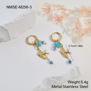 Detailed view of stainless steel swallow and blue flower drop earrings with dimensions