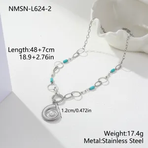 Detail view of stainless steel ocean shell necklace with turquoise beads and pearl