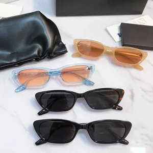 Trendy narrow frame cat eye sunglasses for women, retro chic tinted sun eyewear pieces.