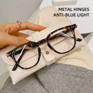 Stylish retro tortoise-shell anti-blue light glasses frames with classic silver rivets.