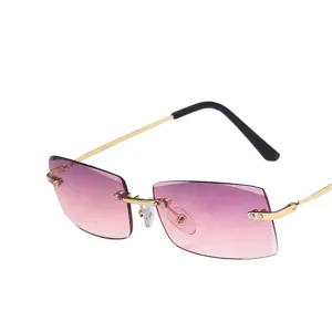 Stylish rimless sunglasses with pink gradient lenses and gold temples for women